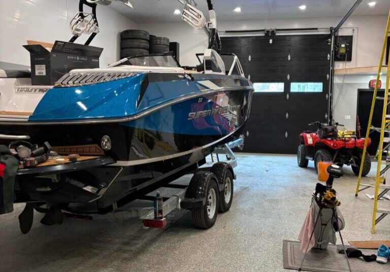 Boat stored indoors with equipment