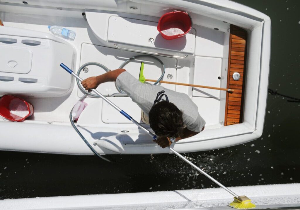 Overhead view of boat cleaning activity